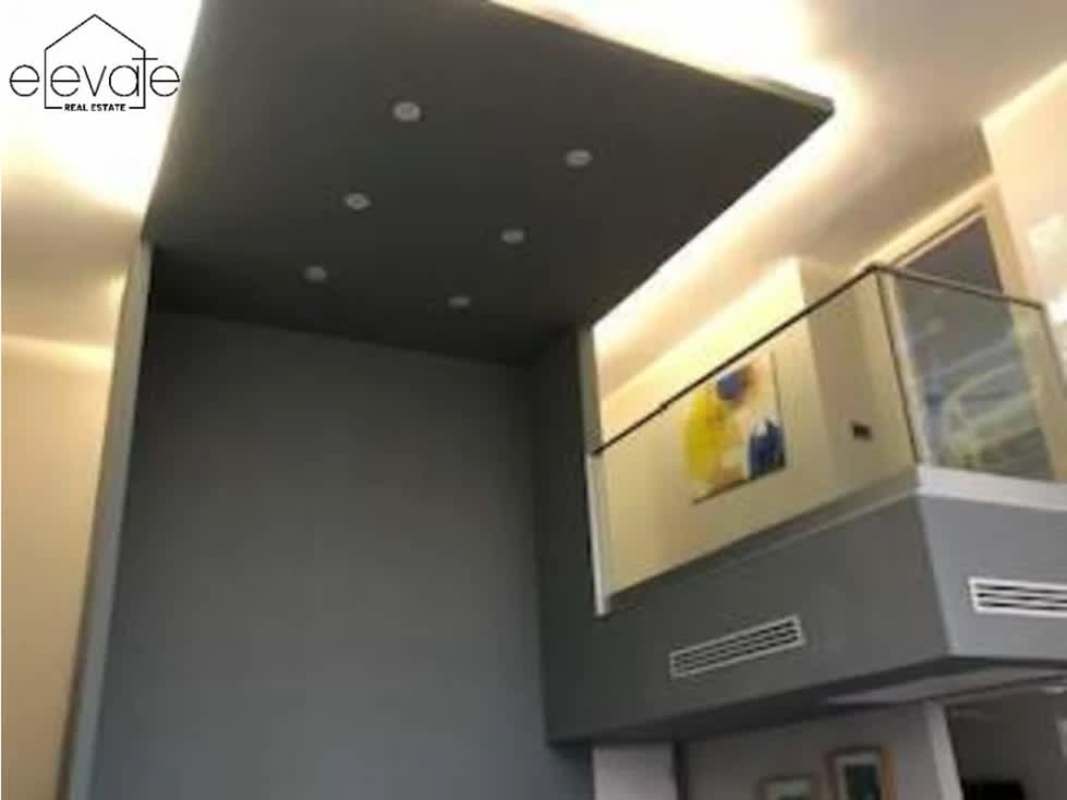 Interior double-height open loft with mezzanine in PH Portanova El Cangrejo Panama