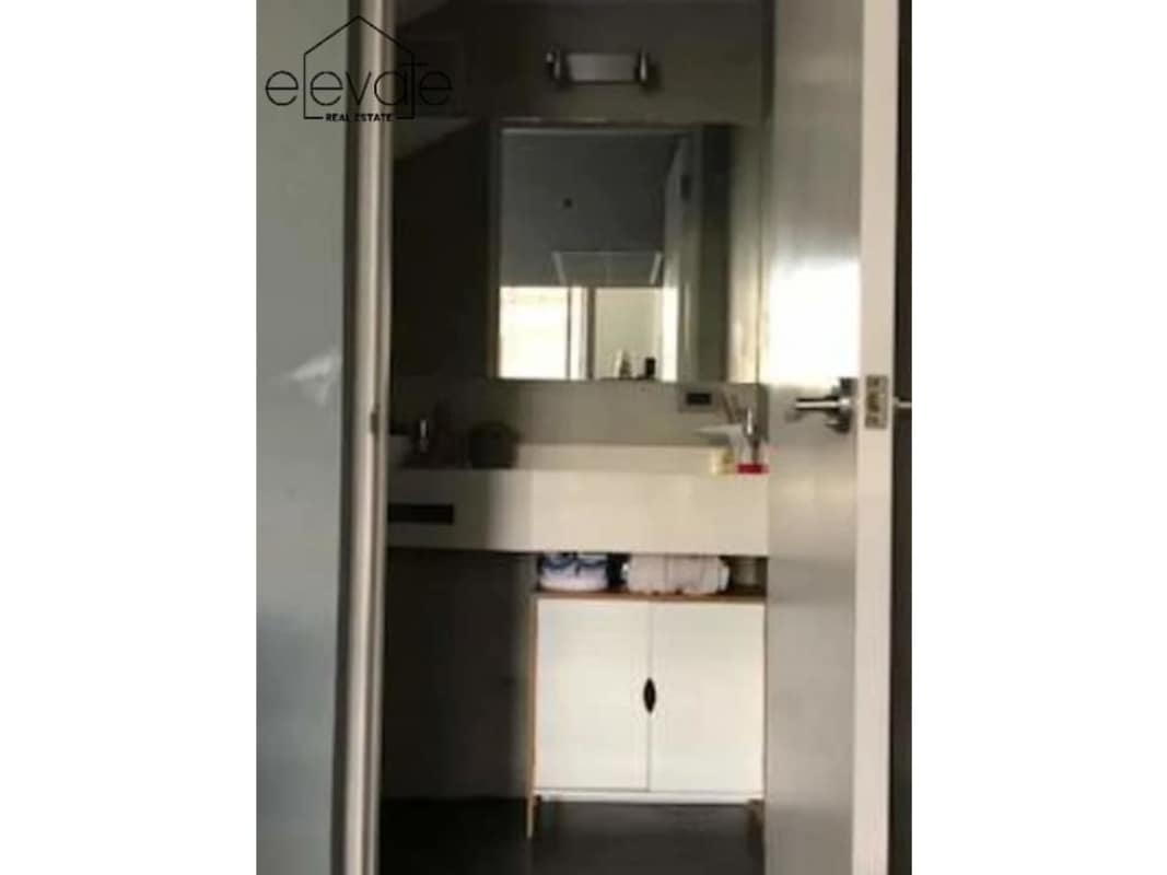 Entrance hallway with view onto loft and living space at PH Portanova El Cangrejo Panama