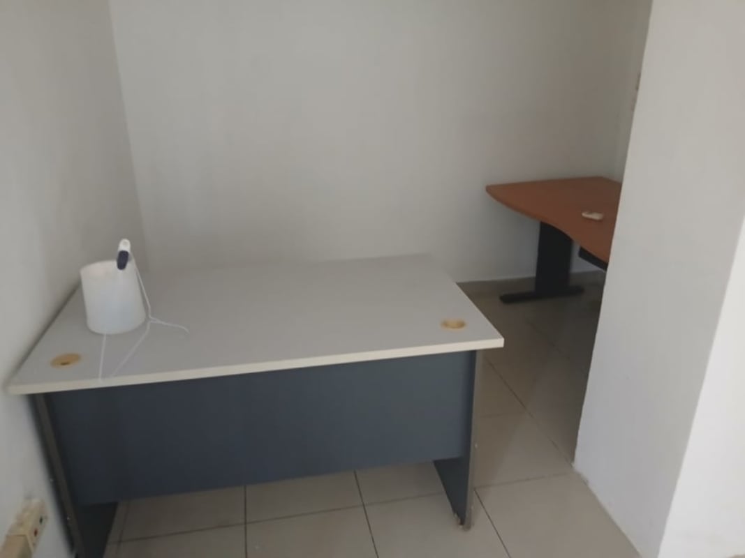 Small office area with desks and partition wall in Obarrio Business Plaza Panama