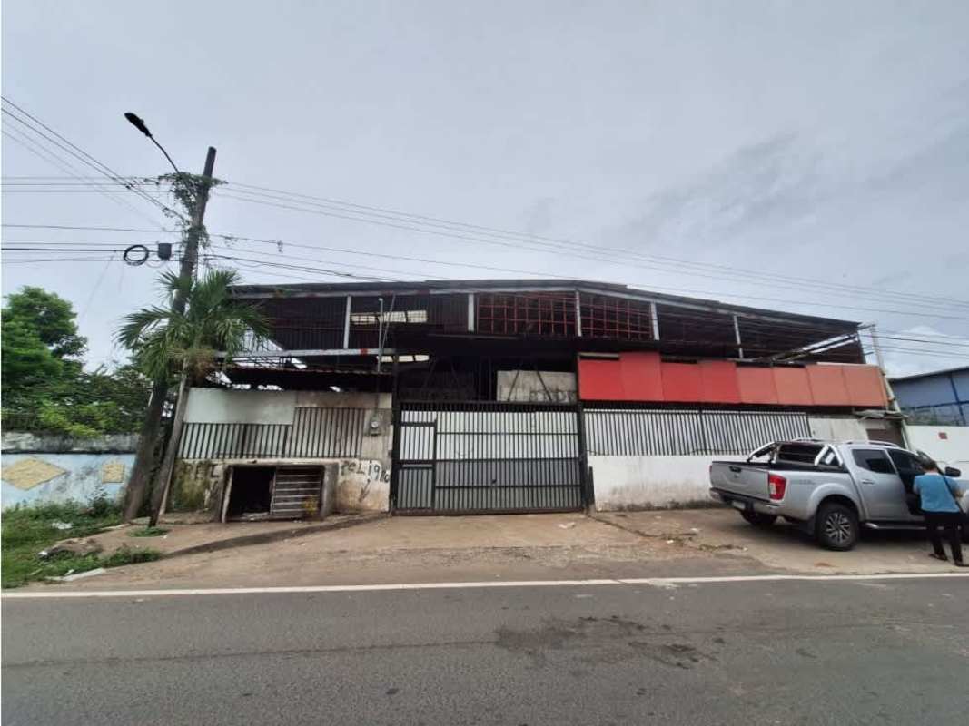 Industrial street view with metal fencing, secure perimeter in Pedregal Panama