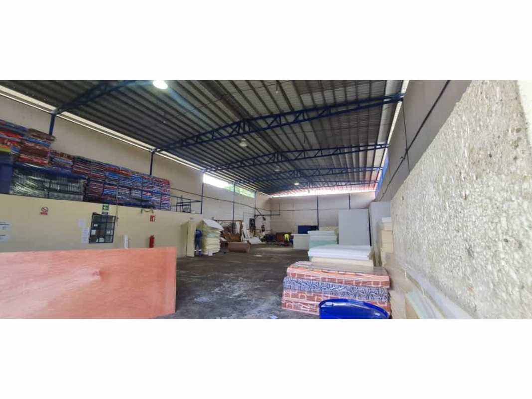 Blue gate and fence exterior of industrial warehouse in Pueblo Nuevo district Panama City