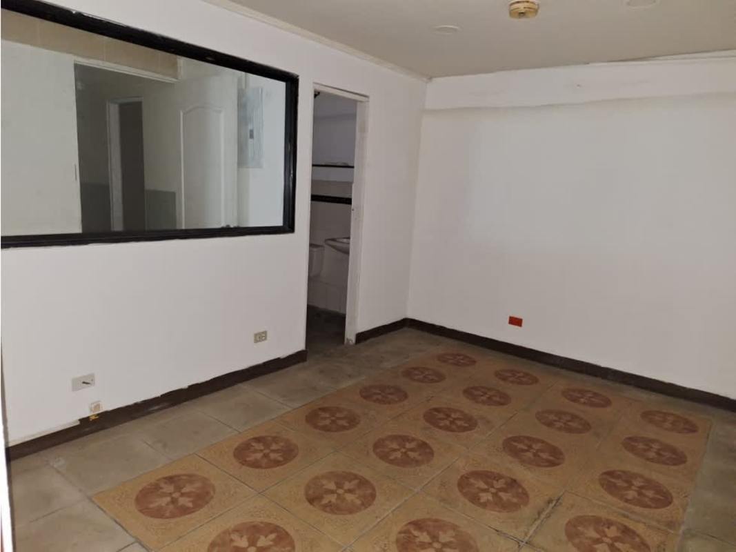 Bright commercial space with office area and tiled floor inside industrial warehouse Panama