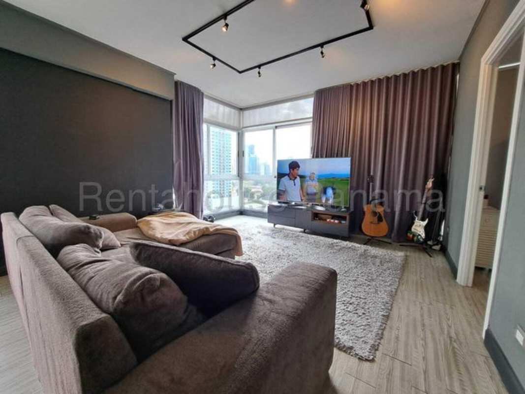 Modern living room with large windows sectional sofa in PH 25 San Francisco Panama City