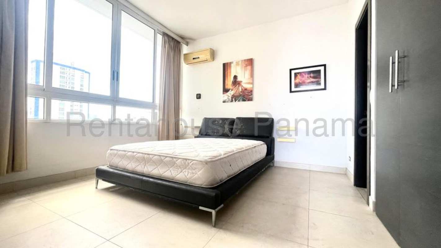 Spacious bedroom large window cityscape PH San Francisco Bay Panama