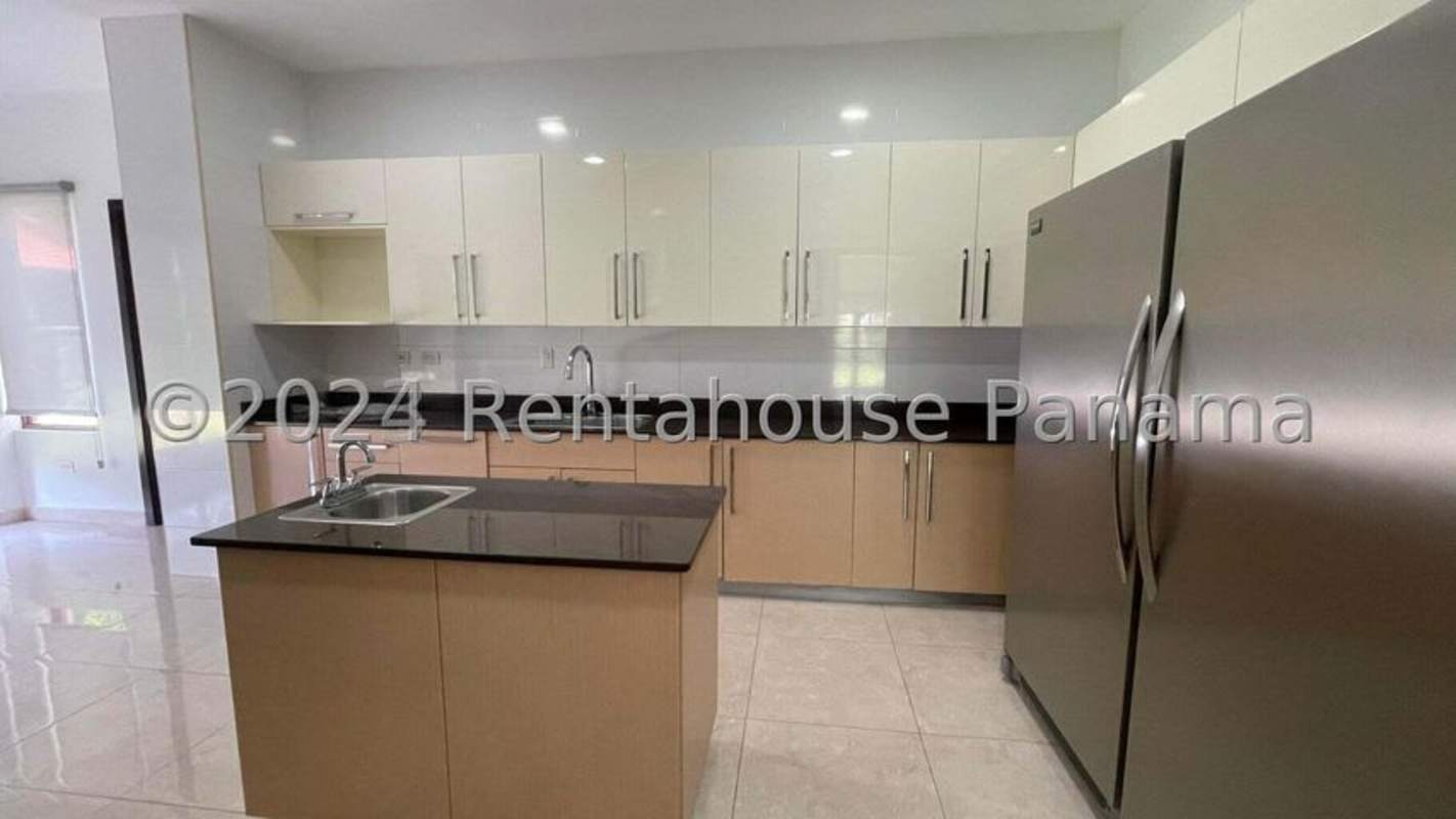 Bright living room with marble floor, ceiling fan, large windows in PH Los Senderos Clayton house rent