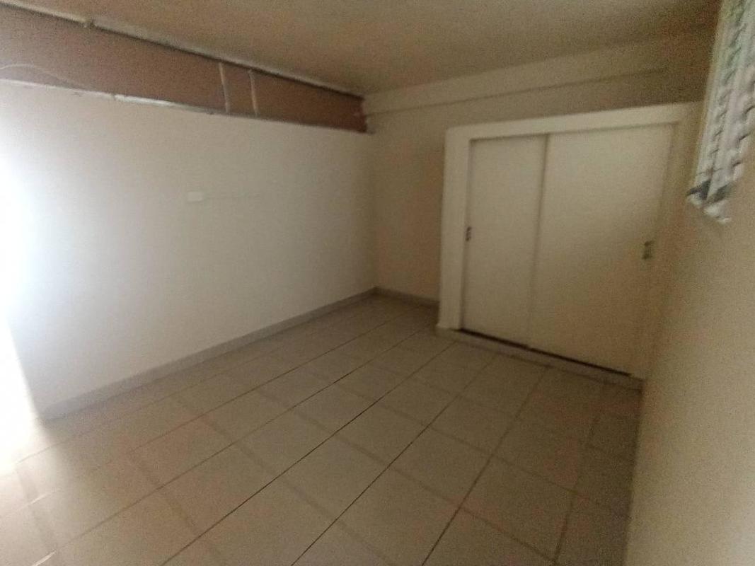 Empty basement or storage space with sliding closet doors, tile flooring, Rio Abajo Panama rental apartment