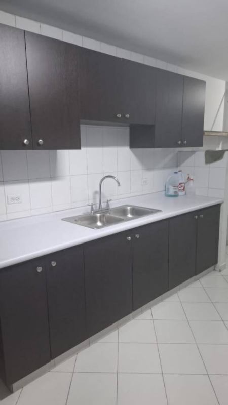 Bedroom with built-in dark wardrobe, bathroom access in PH Mirasol Punta Paitilla Panama