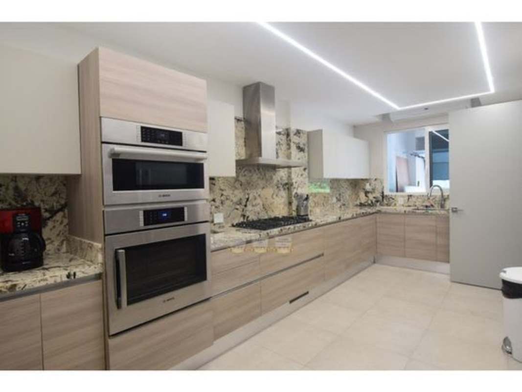 Modern gourmet kitchen with granite counters luxury townhouse Panama