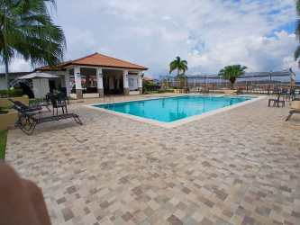 Bedroom with closet, tile floor and ceiling fan in Gran Reserva Montelimar residential Costa Verde Panama