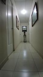 Swimming pool with tropical landscaping and pergola in Gran Reserva Montelimar community Costa Verde Panama