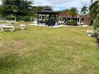 Spacious tropical backyard with gazebo, lawn, patio and garden in Coronado Panama