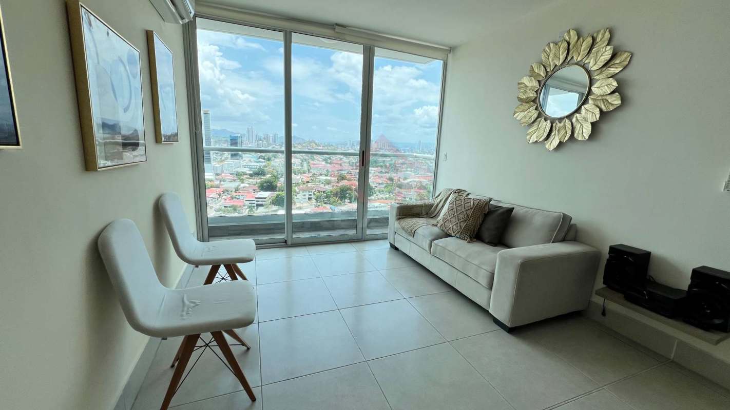 Modern kitchen with granite counters, appliances, breakfast bar in PH Vivendi Green Panama City