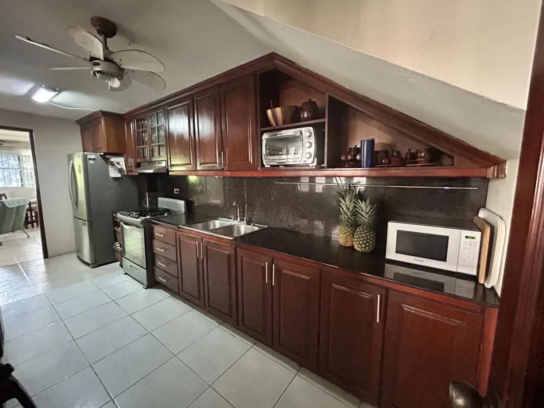 Comfortable family den with windows and tile floors in Condado del Rey Panama