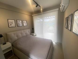 Second bedroom with large window AC at PH The Tides Playa Caracol beach development Panama