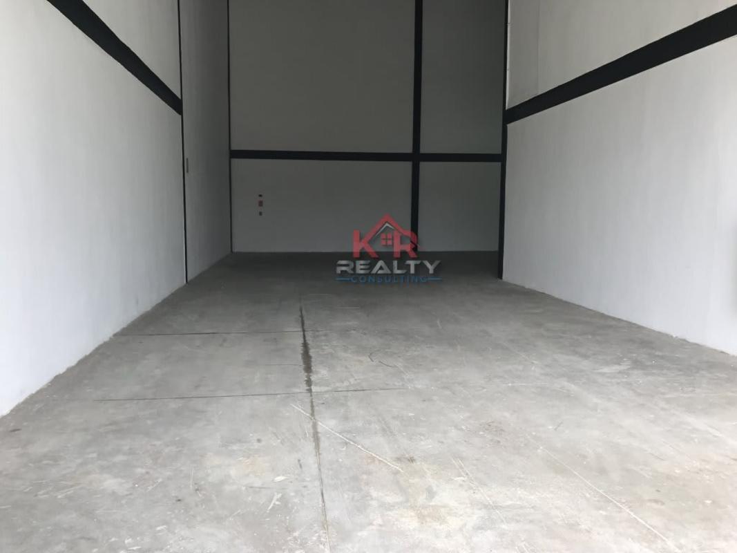 Spacious empty warehouse interior with high ceiling steel structure at Pacora Panama