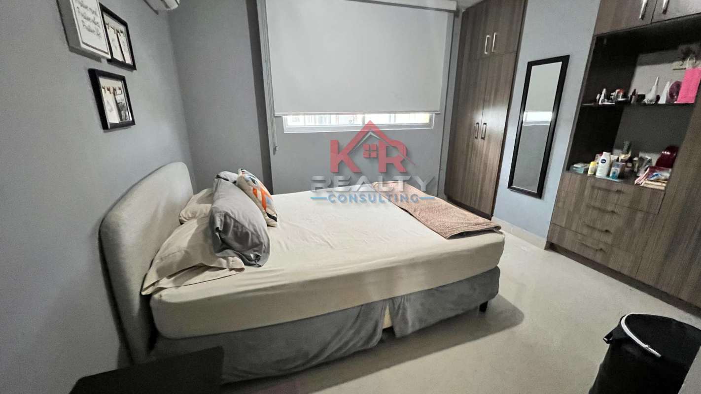 Spacious master bedroom with ensuite bathroom and park view in Residencias del Sol Panama City