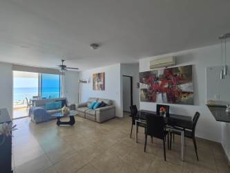 Bright living area with glass doors to terrace and ocean views Playa Blanca Panama