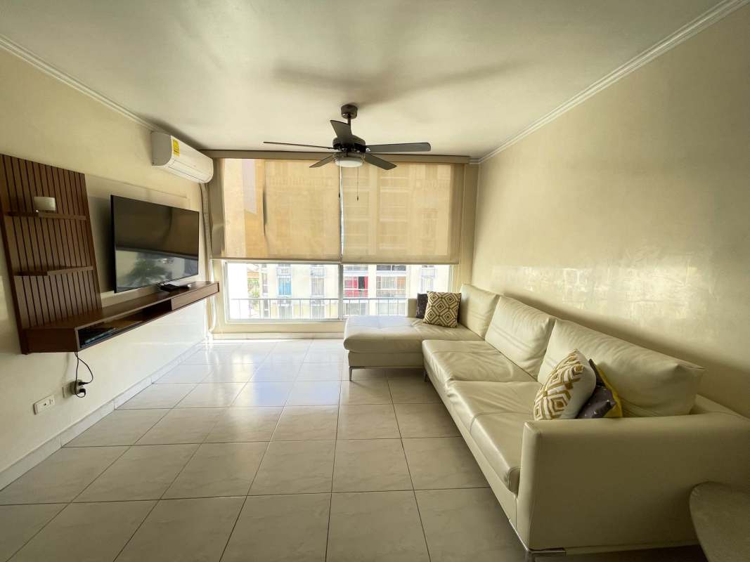 Kitchen with gas stove, range hood, tiled backsplash and fridge PH McGregor Hill Condado del Rey Panama