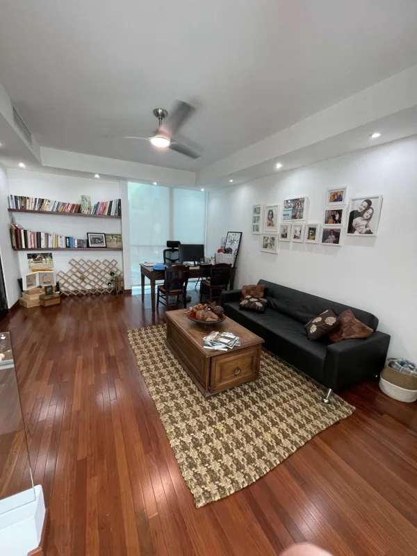 Living room featuring hardwood floors, sofa set, bright lighting in luxury house Altos del Golf