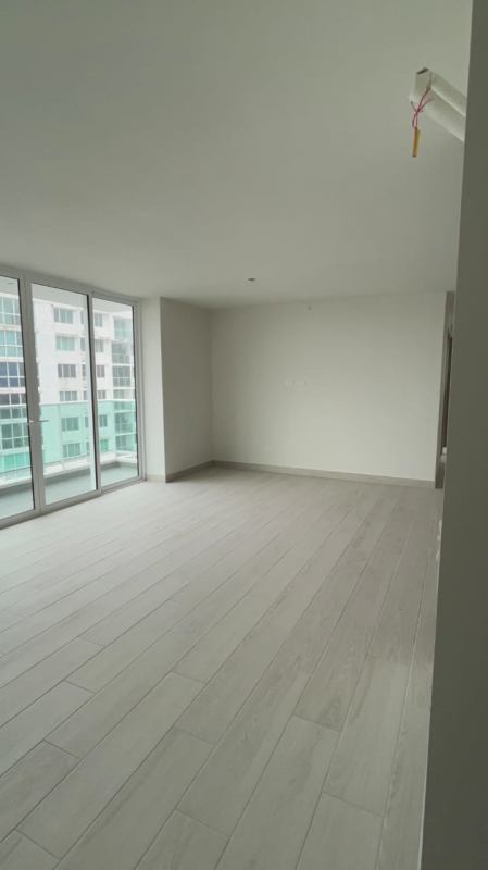 Spacious modern kitchen with island and cabinetry at PH Bonavista at the Park Panama City