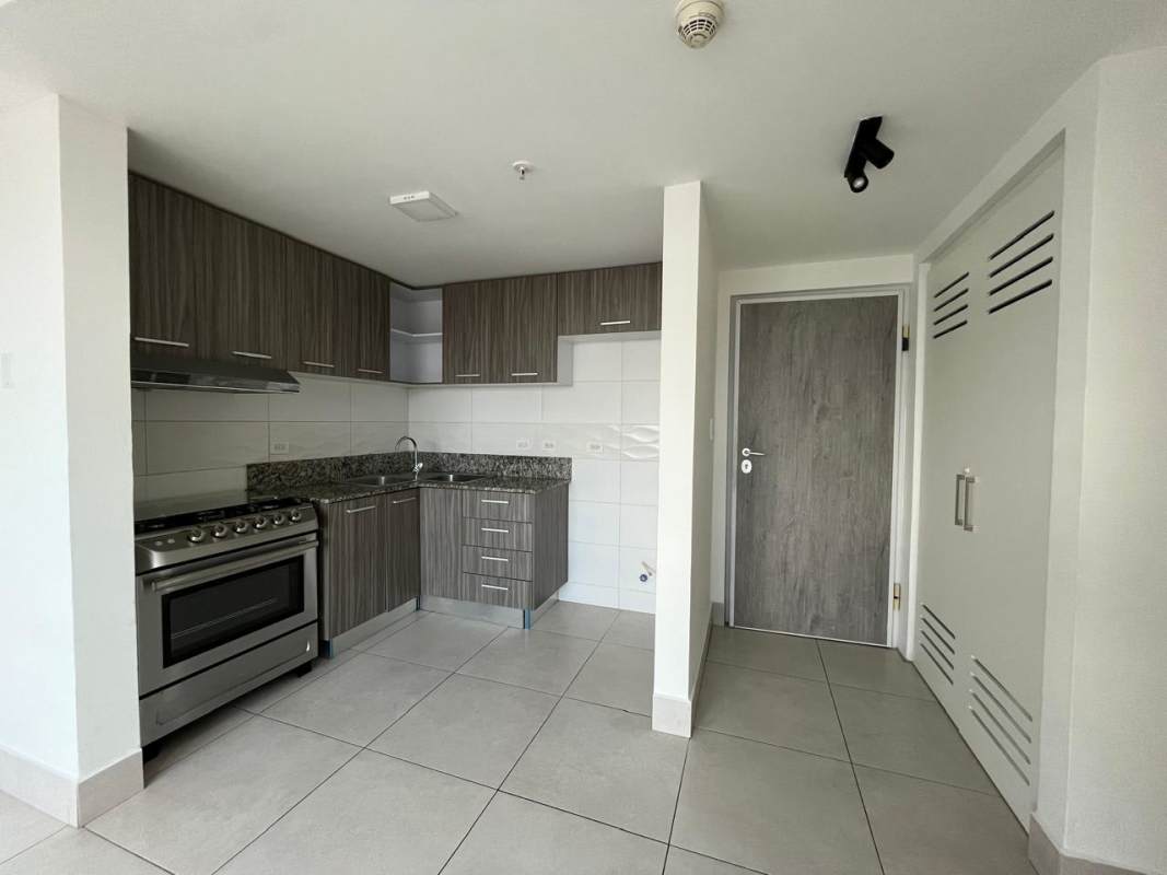 Bright bedroom with large window, ceiling fan, AC at PH Greenwood Panama