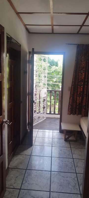 Bathroom with walk-in shower and glass blocks in furnished apartment rental in Coco del Mar Panama