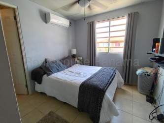 Second bedroom with closet and ceiling fan family house sale La Arboleda Panama