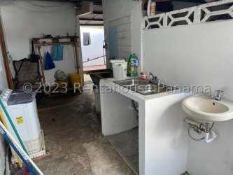 Neighborhood scene with balcony, road, trees in La Chorrera Panama Oeste