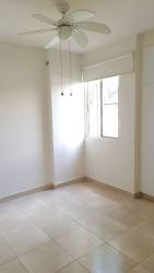 Bright bedroom with closet, window and tiled floor Playa Dorada Arraiján Panama