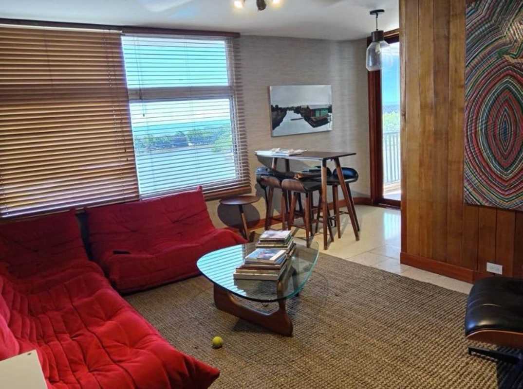 Modern bathroom with marble countertop and large mirror PH Las Llamas Coco del Mar Panama