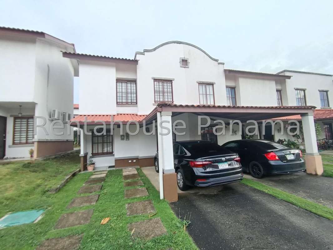Front view of Mediterranean two-level townhouse with garage Villa Zaita Panama