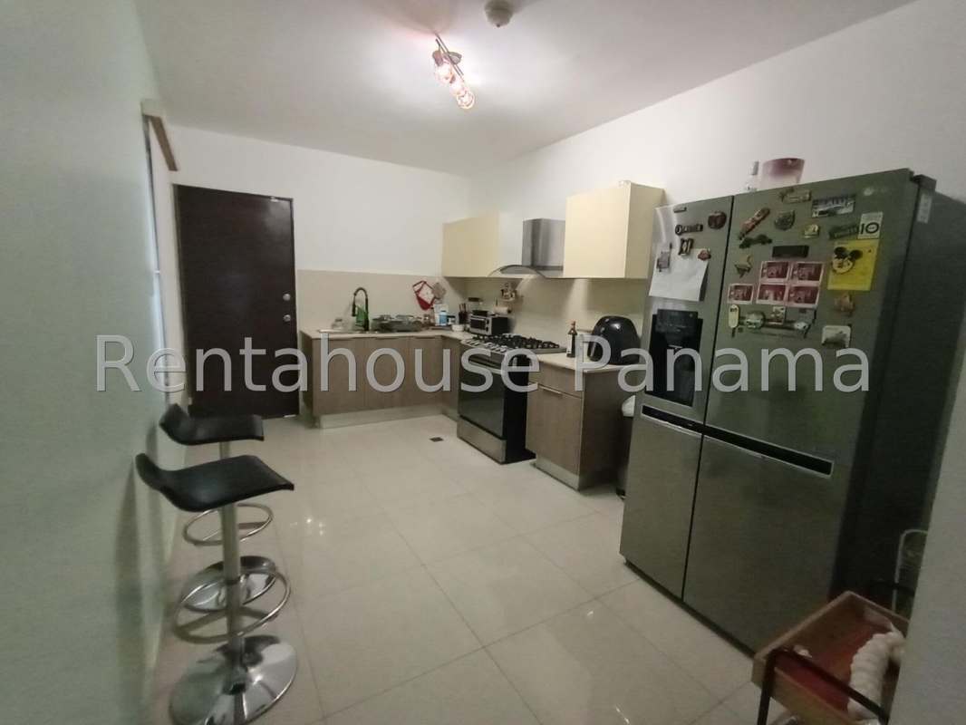 Modern kitchen with breakfast bar and appliances Villa Zaita Gated Community Panama