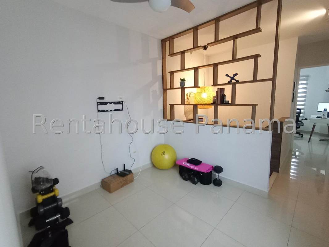 Gated entrance with landscaping and security at La Reserva Villa Zaita Panama