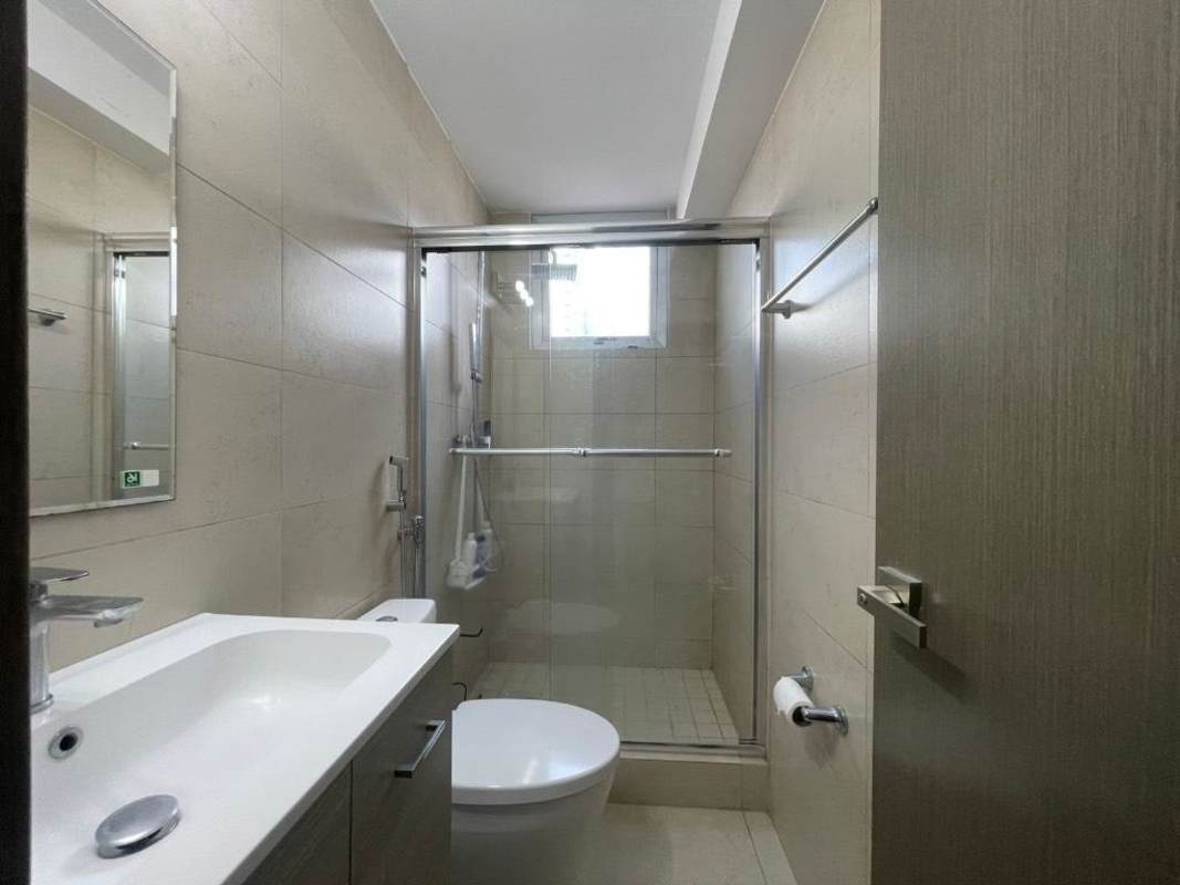 Modern bathroom with glass shower and granite counters PH Lumiere Costa del Este Panama