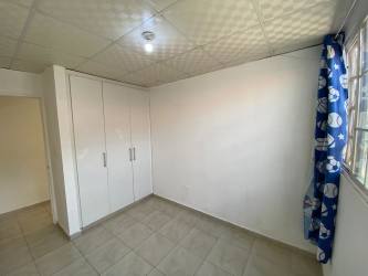 Bedroom with window curtain and tiled floor Mystic City La Chorrera