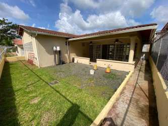 Covered patio terrace with fenced yard house in Mystic City La Chorrera Panama