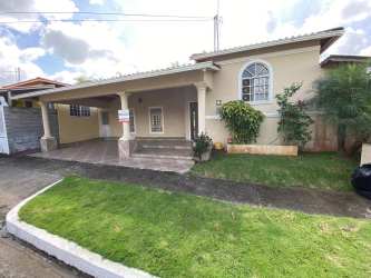 Granite countertop kitchen with upper and lower cabinets in Mystic City house La Chorrera Panama