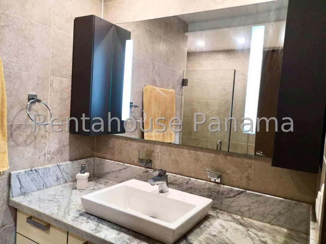 Kitchen with granite counters, gas top cooker, built-in microwave at PH Obarrio Sky Tower Panama