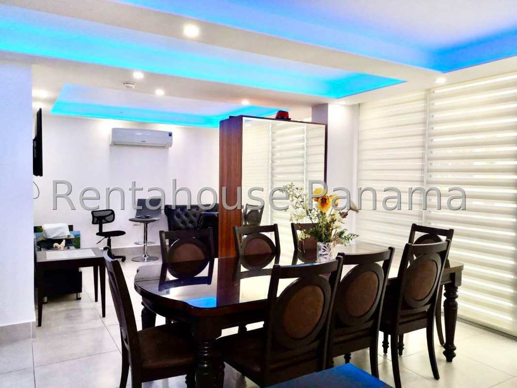 Dining area and living room with blue LED accent lighting in PH Obarrio Sky Tower Panama