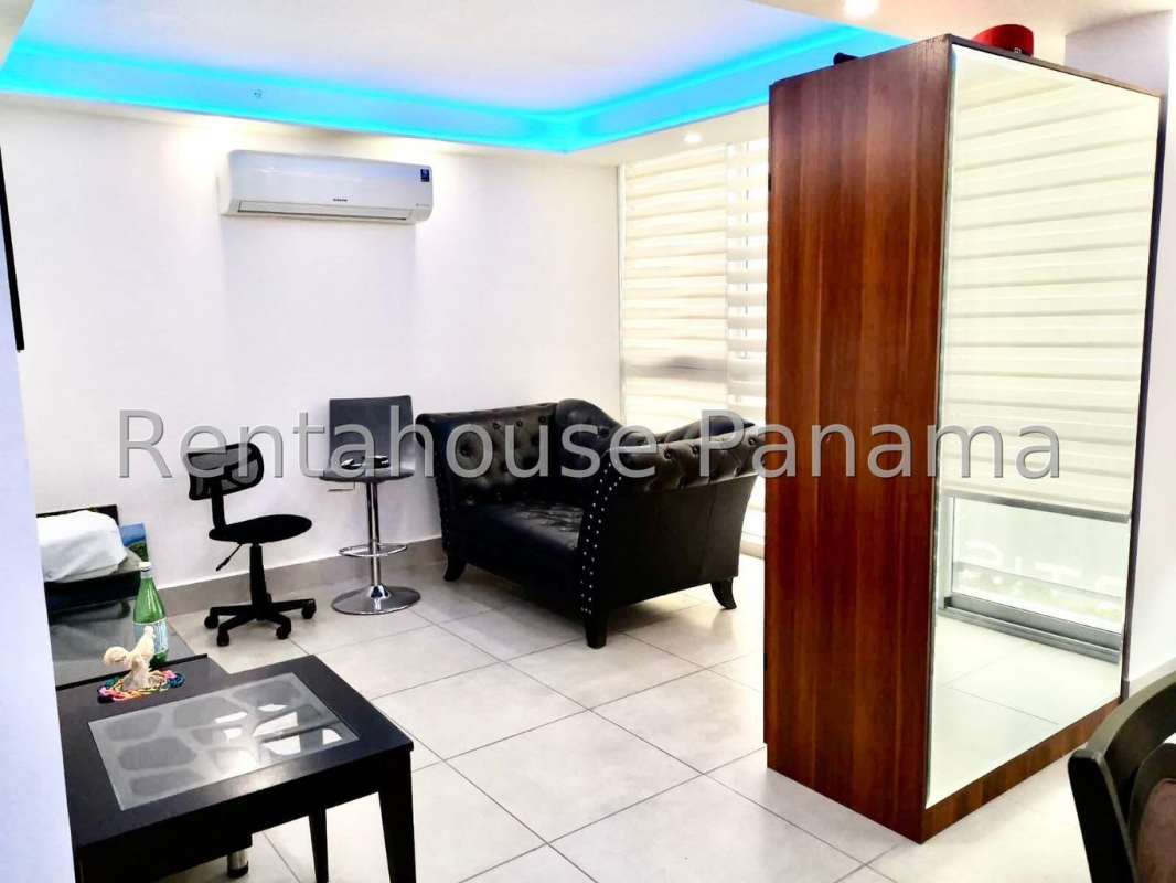 Furnished bedroom with LED lighting, mounted TV, split AC at PH Obarrio Sky Tower Panama City