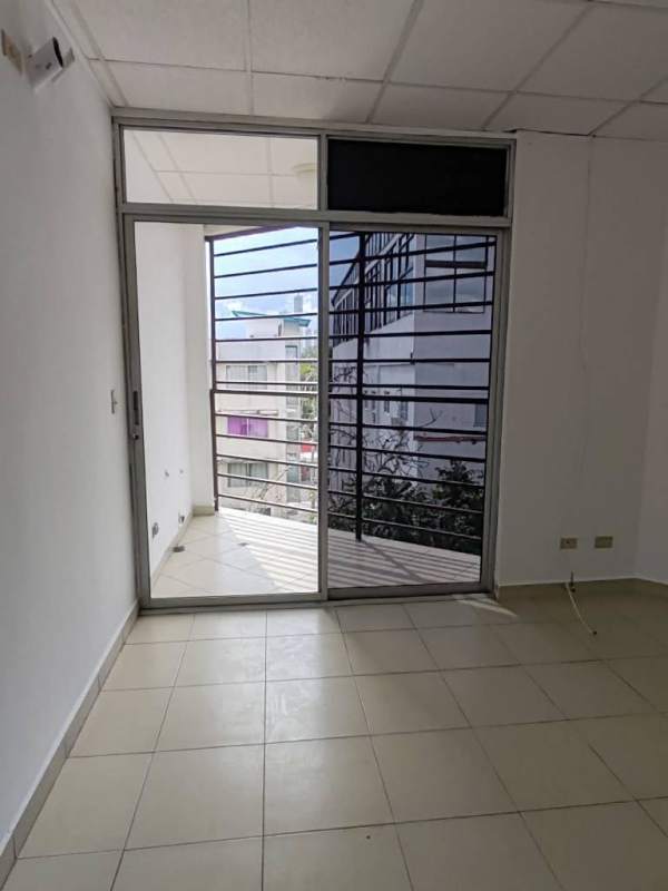 Bright open-plan living dining area with balcony in PH El Ingenio Panama City