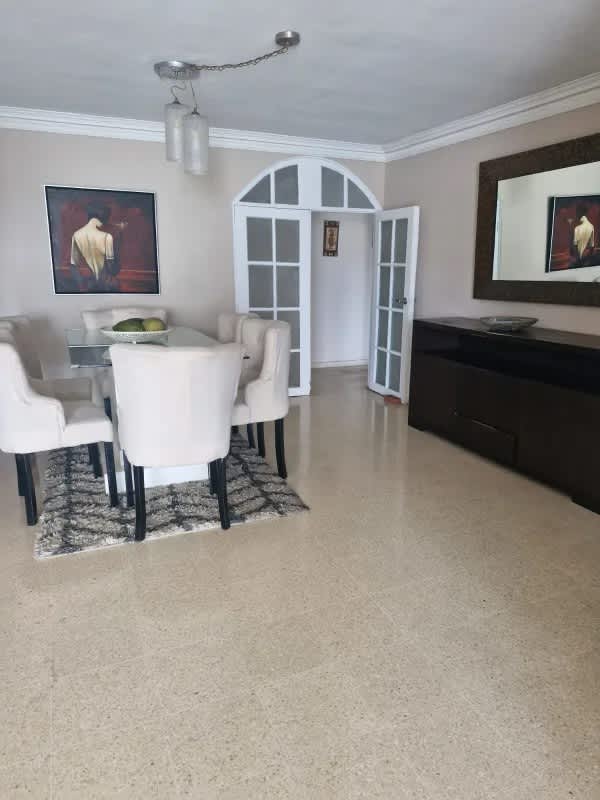 Spacious kitchen with granite countertops, gas stove, and tiled backsplash in PH Marsella Marbella Panama City