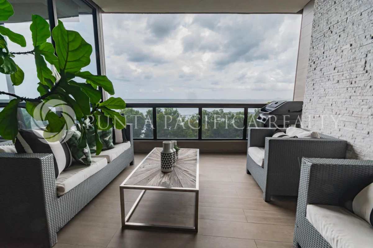 Spacious walk-in closet with organized wooden shelving and clothing at PH Panama Bay Costa del Este