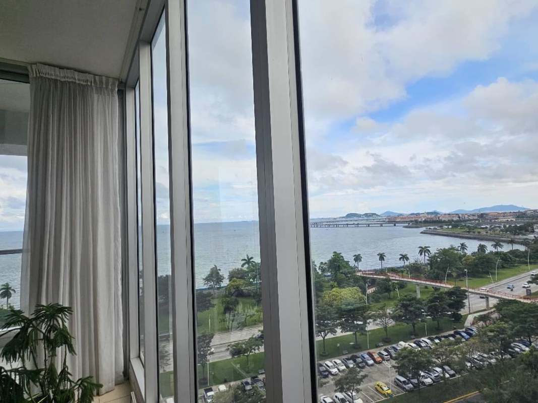 Modern bathroom with marble countertop, glass shower at PH Rivage Tower Panama