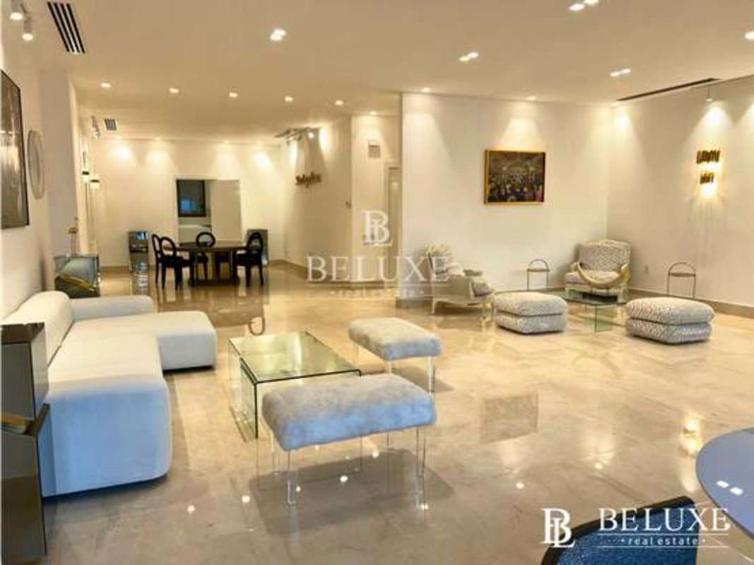 Bright luxury bedroom with floor-to-ceiling window ensuite bathroom PH Garden Ocean Reef Panama City