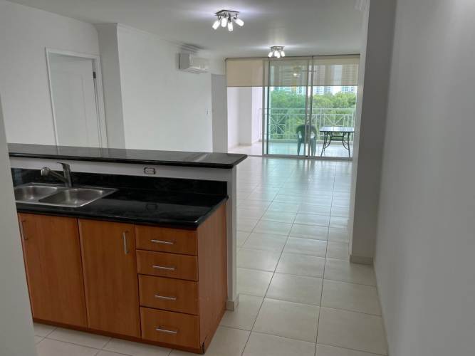 Large balcony terrace with glass railing full Pacific ocean view deluxe apartment in Costa del Este Panama