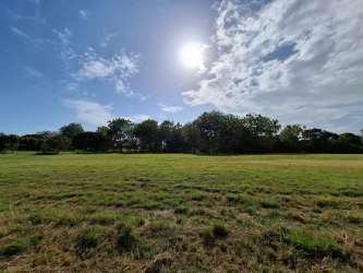 Spacious grassy lot in private beach complex Quintas Sol y Mar near Farallon Panama beach