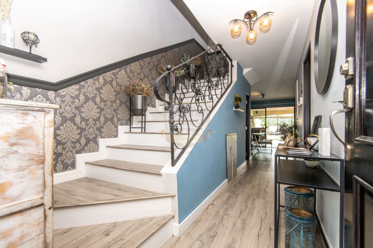 Contemporary living dining room with AC, blue accent wall, sliding doors to patio Green Village house