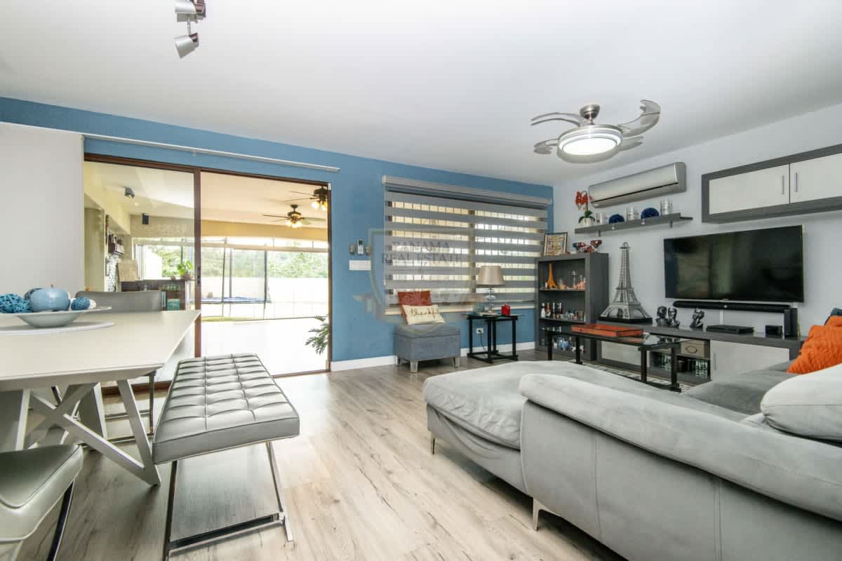 Spacious main bedroom with ceiling fan and large window in Green Village Milla 8 rental house