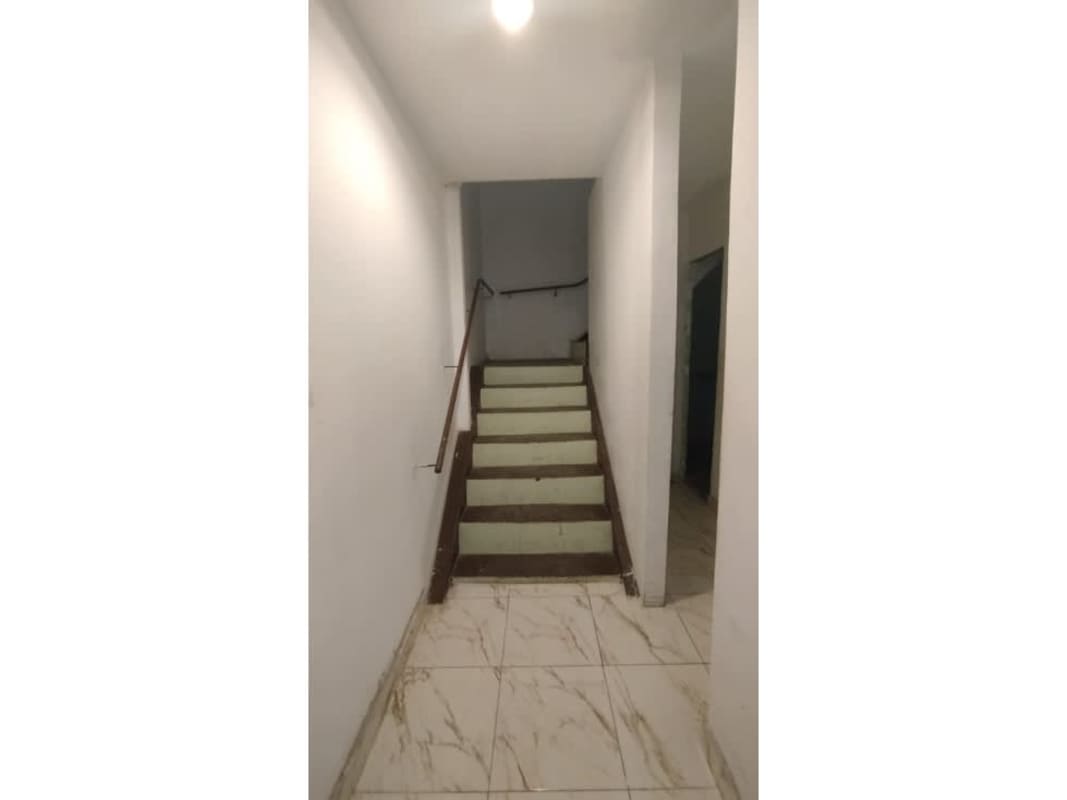 Wide glass entrance with awning and signage space at Plaza Isora Obarrio Panama